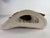 This is a mid-century vintage ceramic sculpture of a bull. This bull was sculpted in a dynamic pose. The sculpture has a...