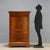 Carlo X style secretaire crafted in walnut, dating back to the second quarter of the 19th century, Italy. This elegant...