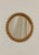 1960s Audoux Minet round wall mirror with twisted rope and a gilt brass inner ring. Mirror glass is clean, minor fraying...