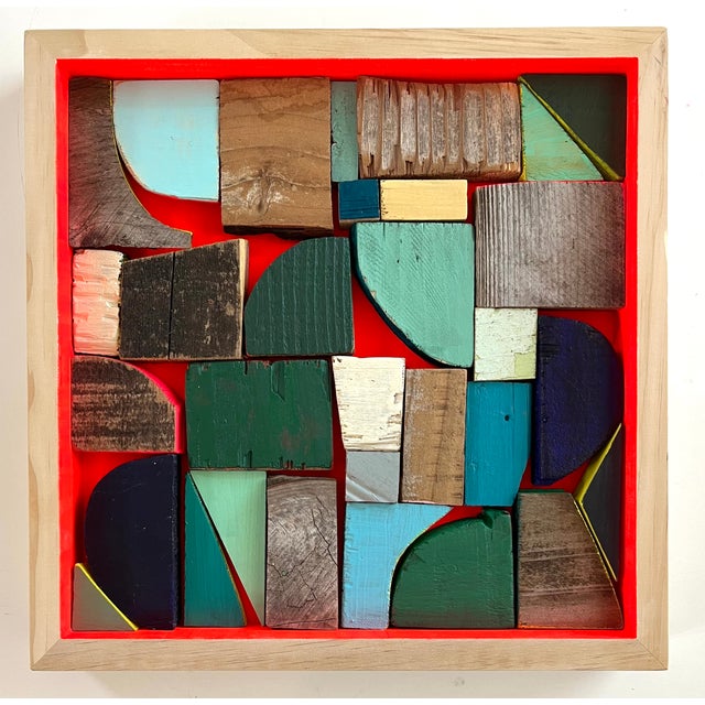 “Color Build: Turquoise Memory” is 12×12x1”, is made with acrylic paint and reclaimed wood and is nestled in a cradled...
