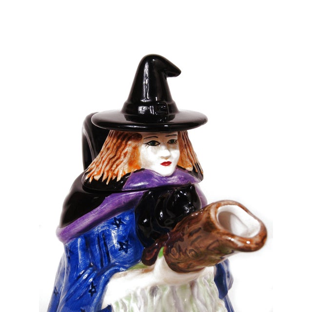 A whimsical 1997 Inspirado IDC “Witchy Poo” Halloween teapot with a lively hand-painted figural design. This decorative...