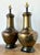 This striking pair of vintage table lamps is a masterclass in Hollywood Regency glamour and mid-century architectural...