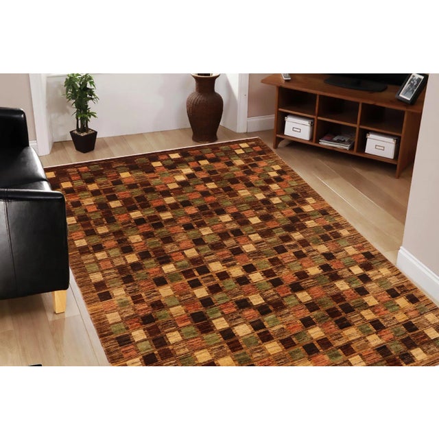 With strict standards of craftsmanship and quality of materials used this modern inspired hand knotted Gabbeh rug is a...