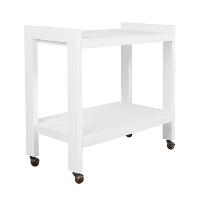 New special order item. Not vintage. The minimalist Rockwell in white washed oak with hand painted bronze casters is the...