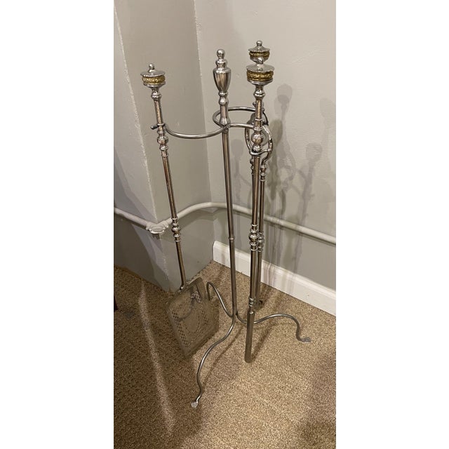 Exceptional set of Polished Steel & Gilt-Metal fire tools on stand. Tongs , shovel & poker ( Stand or a Later date )...