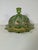This very rare Jefferson Glass green glass covered butter dish is from 1903. The dish features an Iris and Meander pattern...