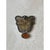 This vintage brooch centers on a substantial carved stone plaque, its irregular, scalloped silhouette shaped with flowing...