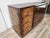 An elegant Italian Art Deco sideboard from the 1940s, crafted from fine walnut and blond walnut, it features a refined...