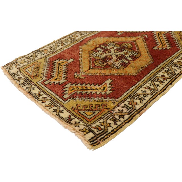 51829 Vintage Turkish Yastik Rug, 01'08 x 02'05. This hand-knotted wool vintage Turkish Yastik rug exudes a vibrant and...