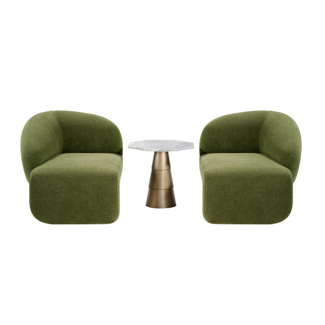 Set of 2 right arm and left arm accent chairs in green textured fabric have matte brass bases made of powder quoted iron....