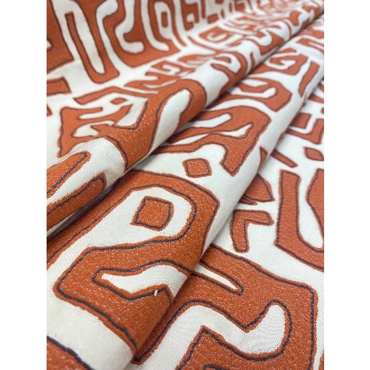 58" wide Robert Allen Kasai Cloth Henna African abstract upholstery fabric in rusty brown and ivory. Price is per yard.