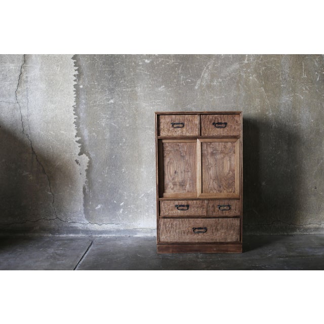 This is an old Japanese-made cabinet. It was made in the early Showa period (1920s-1940s). It features traditional...