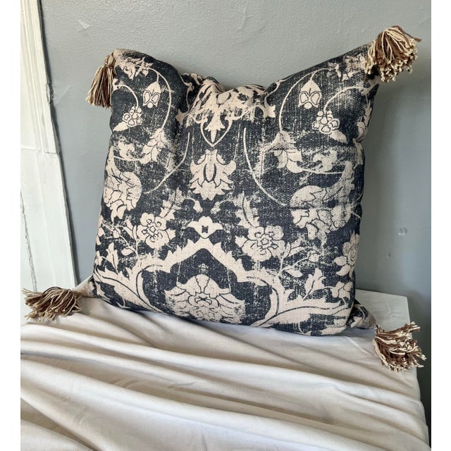 This decorative throw pillow blends contemporary ease with traditional elegance, featuring a softly distressed damask...