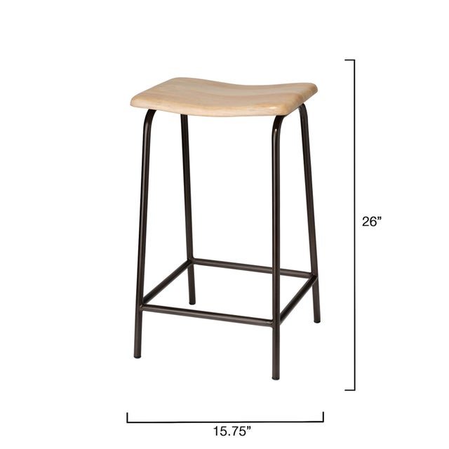 This counter-height stool pairs industrial strength with artisanal beauty. Its hand-forged iron legs, finished in a deep,...