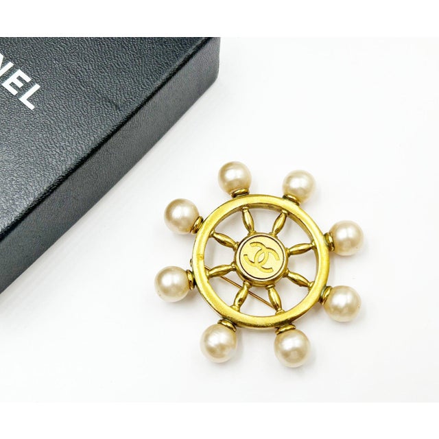 Chanel Vintage Gold Plated Sailor Wheel Faux Pearl Brooch *Marked 94 *Made in France *Comes with original box -It is...
