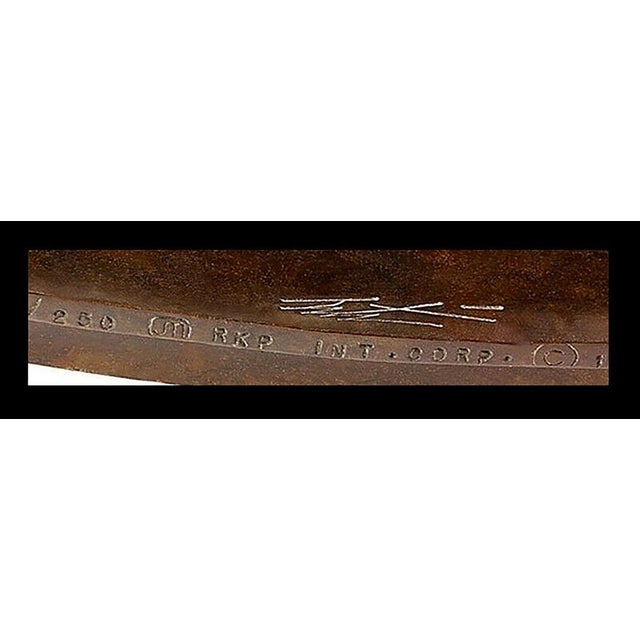You are viewing an Authentic ERTE (Romain de Tirtoff) Bronze Sculpture titled, "Elegance". It measures approx. 16"H x...