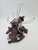 A decorative, highly original wall-mounted coat rack from the early 20th century, crafted from dark-stained wood and...
