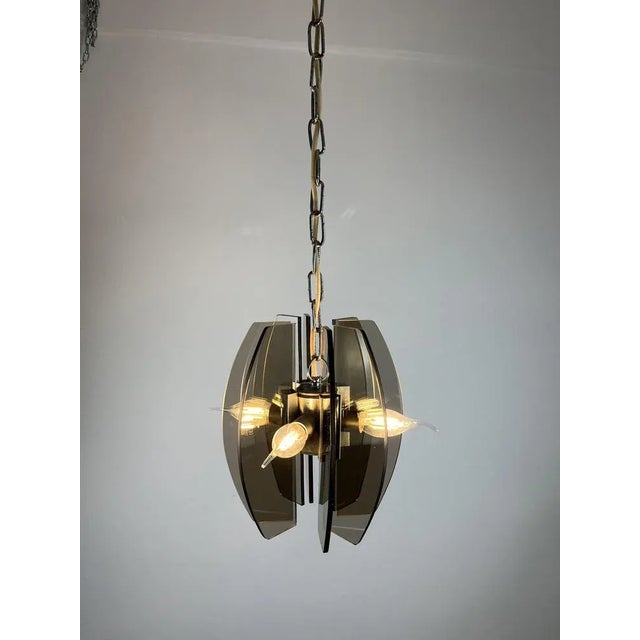 Murano glass chandelier, Veca, Italy, 1970. The glass are in excellent condition and intact. Small signs of time on...