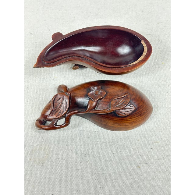 An Antique Japanese wooden lidded box shaped like an eggplant made out of Huanghuali wood. This is a pre-owned item so...