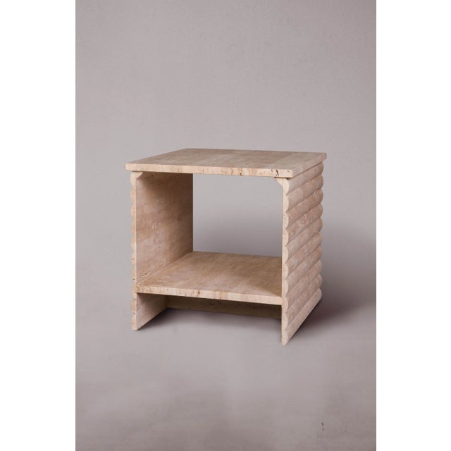 Introducing our elegant travertine nightstand featuring striped edges, adding a touch of sophistication to your bedroom...