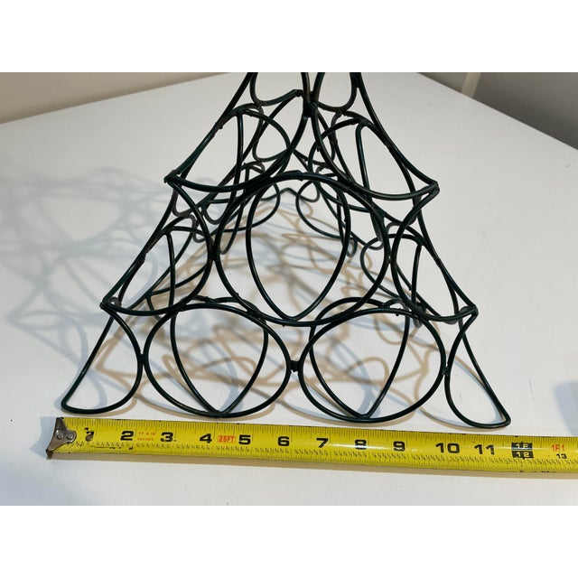 This mid-century modern metal orange stand or fruit pyramid is a stunning addition to any restaurant, store or kitchen...