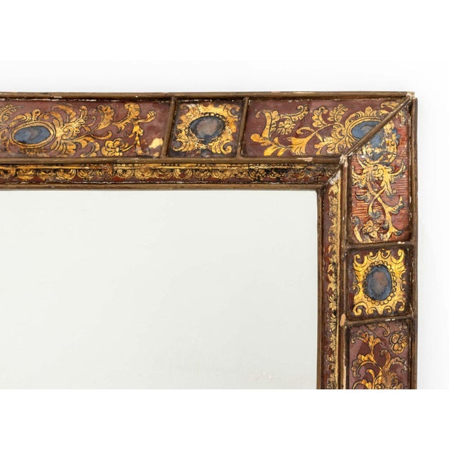 Italian Verre-Eglomise Parclose Giltwood Framed Mirror, with scroll work and vignette motif. Mirror plate: 31.5" H x...