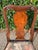 A very beautiful pair of antique Queen Anne style balloon-seated side chairs in a lovely burled wood. Accented with carved...