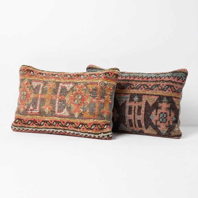 This 12'' x 20'' pillow cover set was made from authentic Turkish rug pieces — tribal star medallions in dusty pink and...