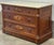 Stunning late 19th century chest features the opulent and detailed aesthetics of the Victorian Renaissance Revival or...