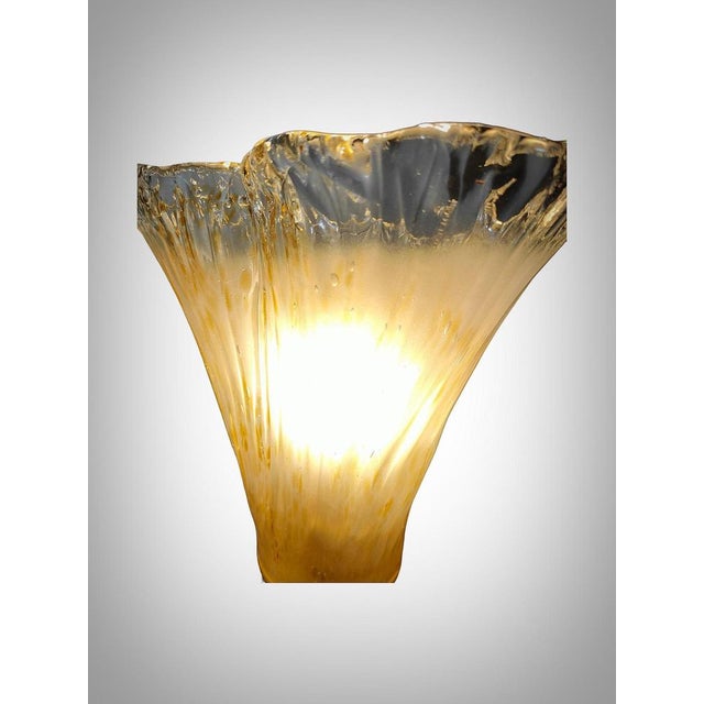 Transform your space with this captivating pair of table lamps, true masterpieces of Murano glass craftsmanship from the...