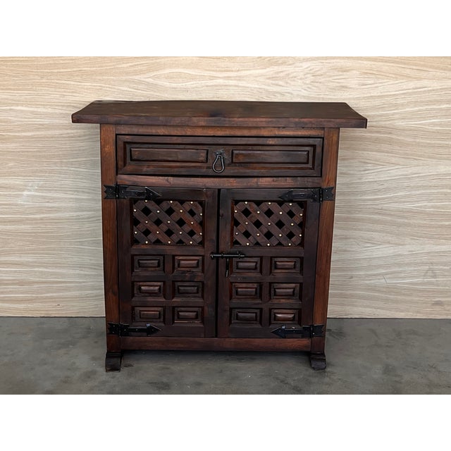 20th century Catalan Spanish carved walnut chest of drawers, highboy or console Country Provincial Chiffoniere was...