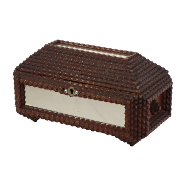 A beautiful antique tramp art box featuring mirror panels on the sides and top, pointed feet, and a triangular lid; the...