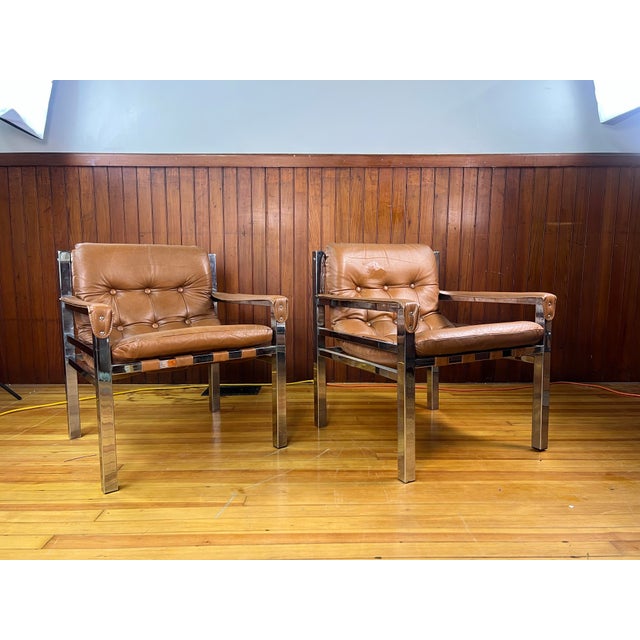 This is a great unique set of vintage Mid-Century Modern Chrome and Leather Safari Lounge Chairs. These are very unusual...