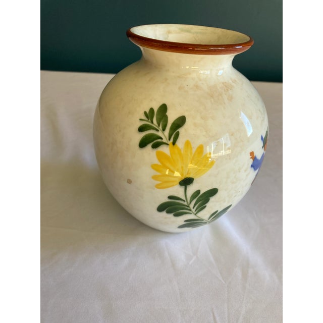 A delightful vintage ceramic vase showcasing a hand-painted Bavarian folk dance scene. The dancers, clad in traditional...