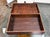 Design Plus Gallery presents a Vintage Red Lacquered Wood Storage Chest. The chest is detailed with engraved metal...