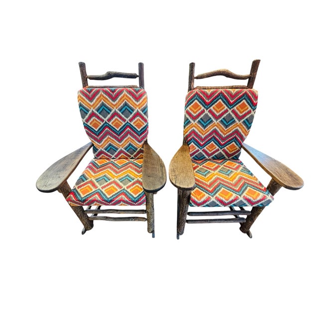 These rocking chairs are crafted in a classic American Rustic or lodge aesthetic with natural steam-bent wood saplings or...