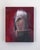 This oil on panel artwork features a striking depiction of a warrior's helmet, rendered with a smooth, reflective surface...