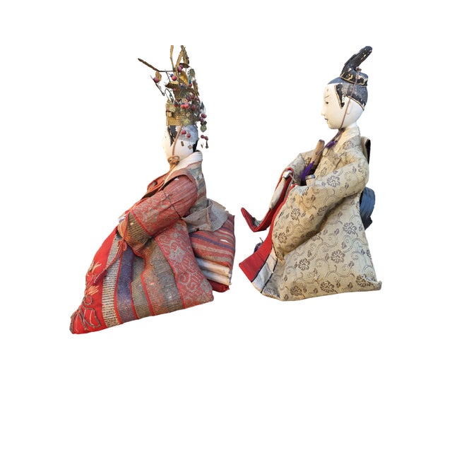 A rare and impressive pair of antique Japanese Meiji period Hina Dolls depicting the Emperor (Odairi-sama) and Empress...