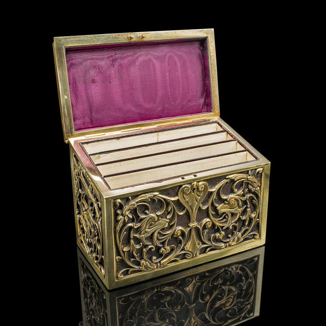 This is an antique stationery box. An English, brass tabletop letter case, dating to the late Victorian period, circa...