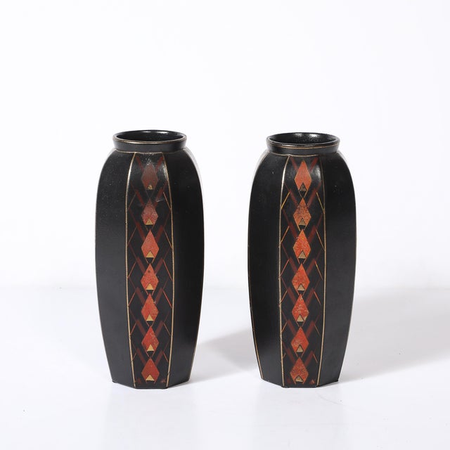 This stunning pair of Art Deco ceramic vases, designed by the renowned Faïencerie St. Ghislain in France, dates to...