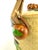 A charming vintage Japanese majolica biscuit jar featuring a molded basket-weave ground with colorful raised fruit and...