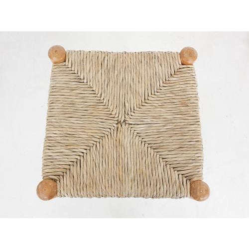 About this item Two blonde wooden bar stools with rattan seating. The rattan is in good condition. The wood has some...