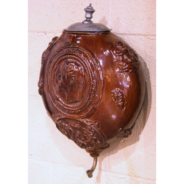 Decorate a entry wall or hallway with this elegant antique terracotta fountain. Crafted in France, circa 1830, the...