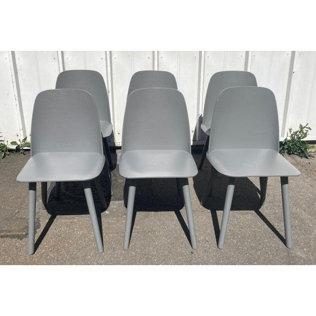 Set of 6 Nerd Chair bistro chairs by Muuto. Entirely made of dark gray wood. In good condition. Seat height 47cm. Perfect...