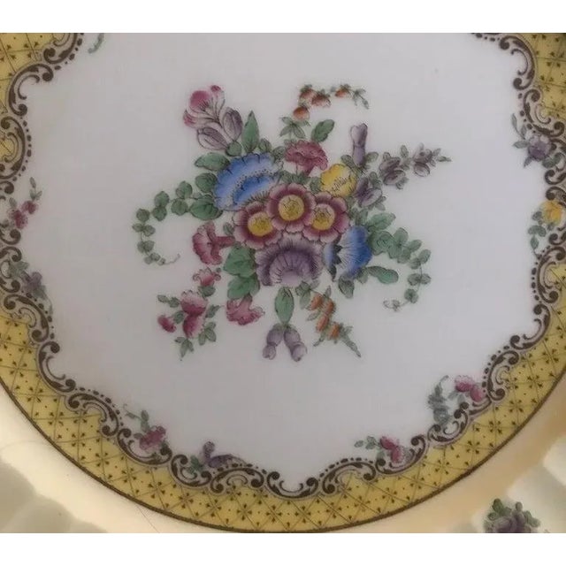 A set of 12 English Royal Worcester floral service plates titled Willoughby. The set was made in the early 1930s and was...