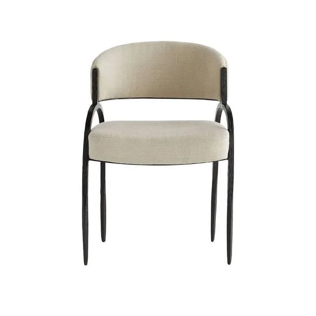 A curved back and large seat rest on a perfectly poised iron frame to compose the foundation of the Bahati. Natural iron...