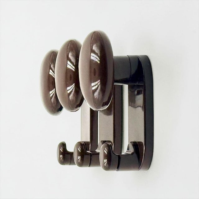 This set of wall hooks designed by Carlo Bartoli for Con and Con in the 1970s represents a concise example of Italian...