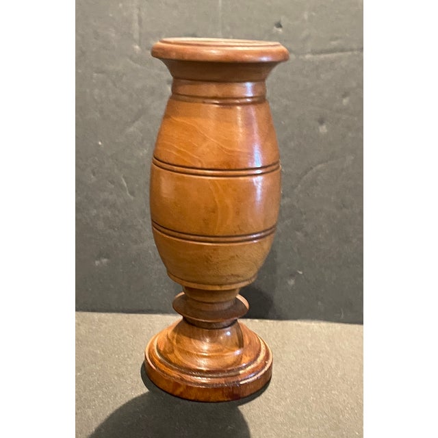Antique English treenware bud vase. Baluster form with ribbed decoration. Unsigned.