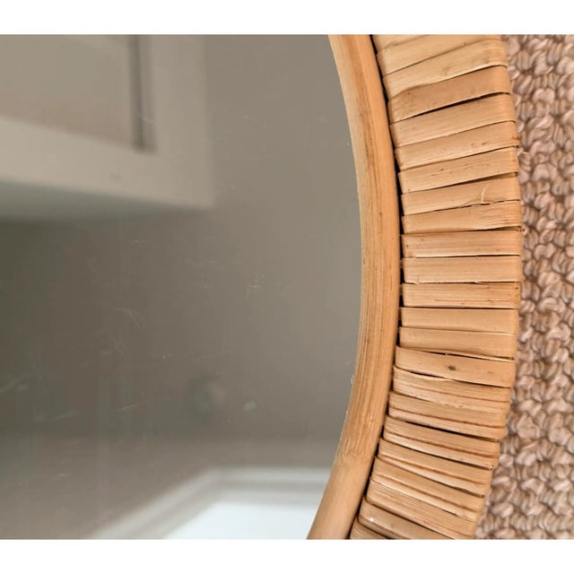 Gorgeous vintage rattan round mirror. Chic and simple make this perfect addition to any decor. Acquired from a palm Beach...