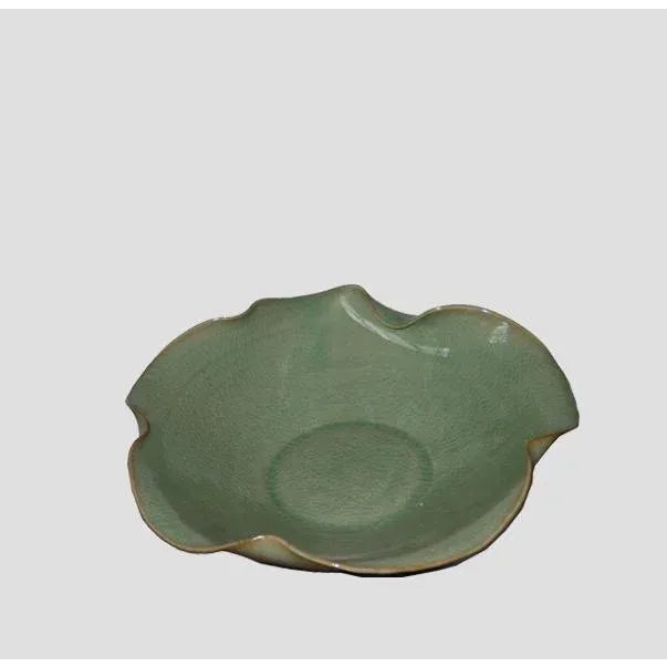 Those two lovely plates are made from Jun Porcelain. Different from colorful Jun Porcelain, Ge celadon has a grayish-blue...